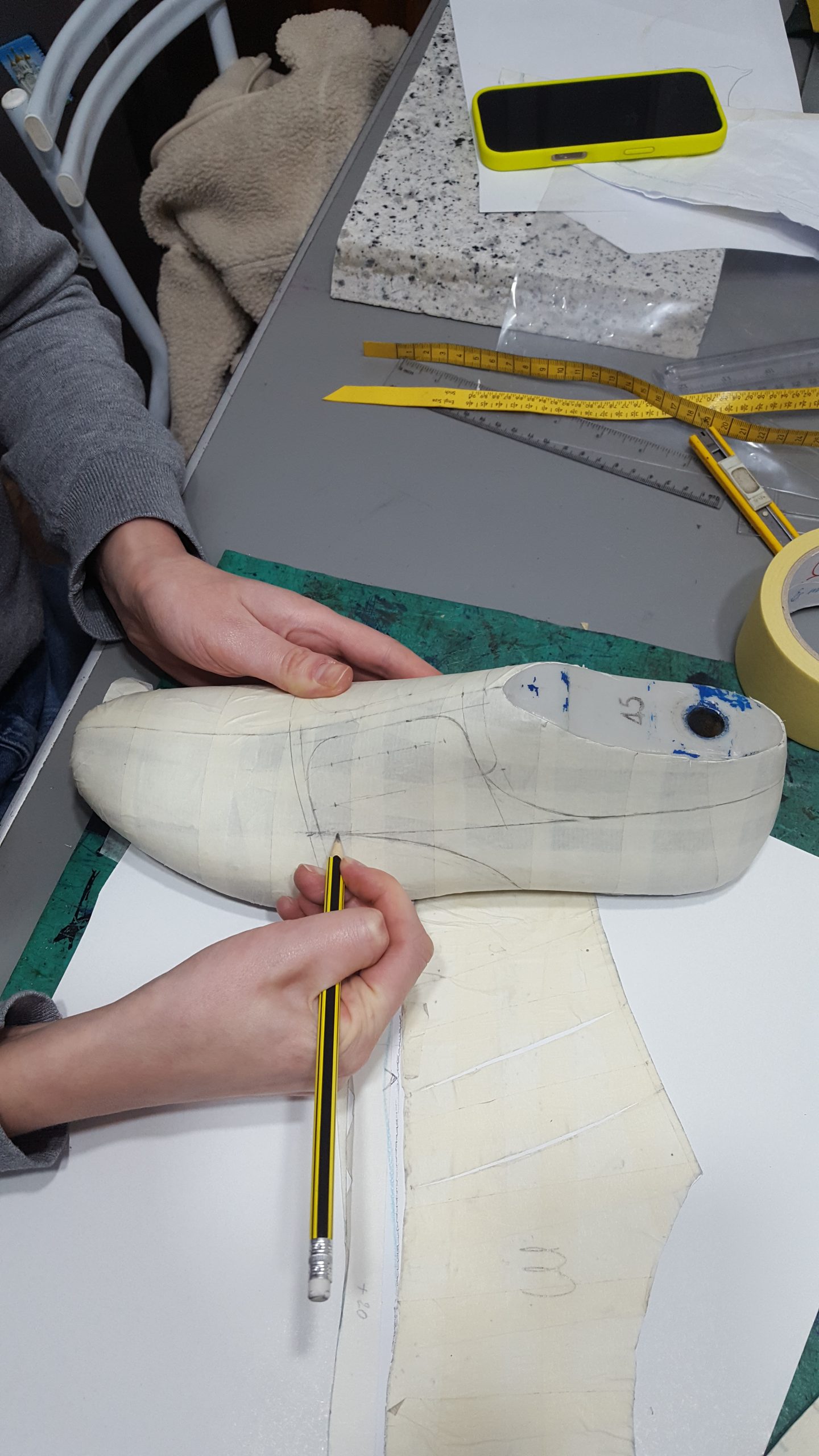Detailed look at traditional shoe stitching